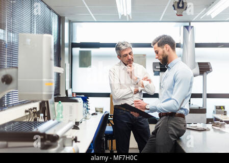 Businessmen during meeting Stock Photo