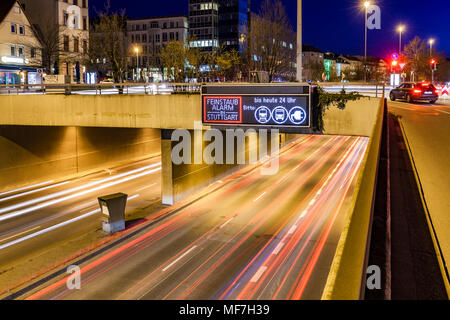 Germany, Stuttgart, Warning sign for particulate pollution on street Stock Photo