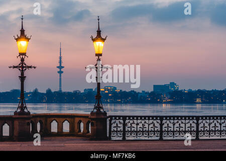 Germany, Hamburg, Outer Alster Lake, Schwanenwik Bridge, Heinrich-Hertz Tower in the evening Stock Photo