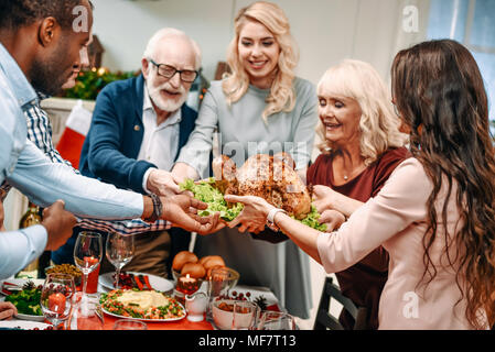 family holding christmas turkey Stock Photo