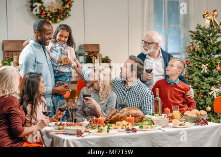 large family celebrating christmas Stock Photo - Alamy