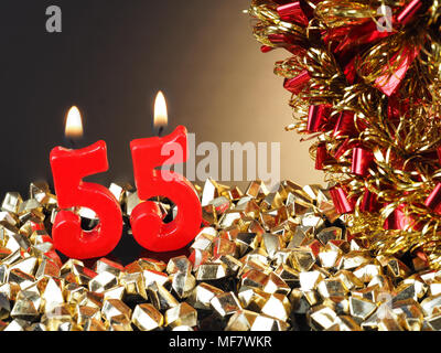 Abstract Background for birthday or anniversary. Red candles showing Nr. 55 Stock Photo