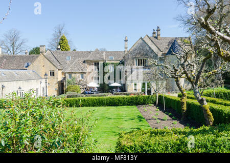 Garden at The Lords of The Manor luxury country hotel in the pretty Cotswold village of Upper Slaughter in Gloucestershire,UK Stock Photo