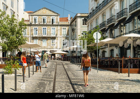 LISBON, PORTUGAL - AUGUST 13, 2017: Tourists Walking Downtown Lisbon City In Portugal