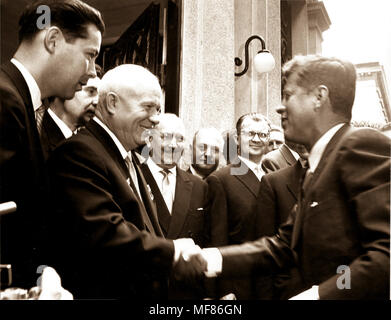 PX 93-33:37    JUN1961 Soviet Chairman Nikita Khrushchev greets President John F. Kennedy as he enters the Soviet Embassy in Vienna, Austria.  Please credit 'John F. Kennedy Presidential Library and Museum, Boston' Stock Photo