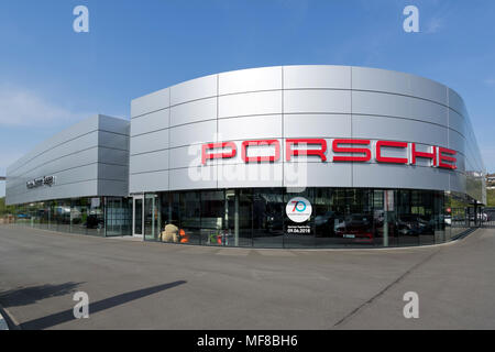 Porsche Zentrum Siegen. Porsche is a German automobile manufacturer specializing in high-performance sports cars, SUVs and sedans. Stock Photo