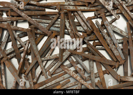 collection of wooden flooring brad cut clasp nails 3 inches 65mm showing signs of age and rusting iron steel black carbon coating is failing mf8tbf