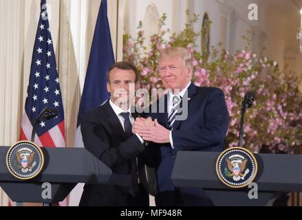 Washington, USA. 24th Apr, 2018. U.S. President Donald Trump (R) and French President Emmanuel Macron attend a joint press conference at the White House in Washington, DC, the United States, April 24, 2018. Macron is on a state visit to the United States from Monday to Wednesday. Credit: Yang Chenglin/Xinhua/Alamy Live News Stock Photo