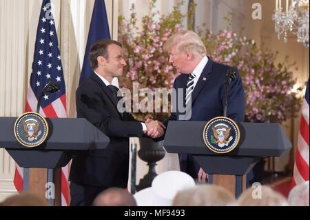 Washington, USA. 24th Apr, 2018. U.S. President Donald Trump (R) and French President Emmanuel Macron attend a joint press conference at the White House in Washington, DC, the United States, April 24, 2018. Macron is on a state visit to the United States from Monday to Wednesday. Credit: Yang Chenglin/Xinhua/Alamy Live News Stock Photo