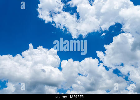 White cumulus clouds in deep blue sky. Cloudscape. Natural abstract background. Stock Photo