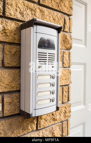 intercom on a brick wall at the door Stock Photo
