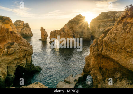 Stunning cliffs and arches in Ponta da Piedade in the early morning, Lagos, Algarve, Portugal Stock Photo