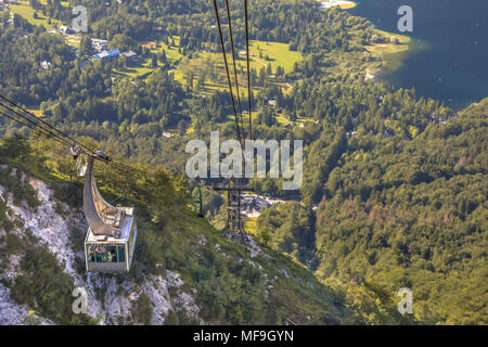 Gondola ski lift in summer taking hikers into the mountains of Vogel area near Bled, Slovenia Stock Photo