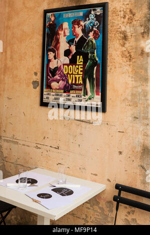 Cvijete Zuzorić, stari grad, Dubrovnik, Croatia: restaurant table in street and film poster on wall Stock Photo