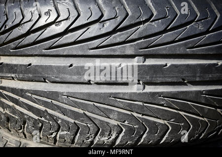 Close up picture of used black car tire. Stock Photo