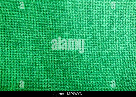 Textile Texture, Close Up of Green Sack or Burlap Fabric Pattern Background in Pastel Colors Tone. Stock Photo