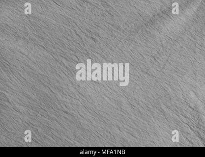 High quality silver fabric texture. Grey background with delicate striped pattern. Stock Photo