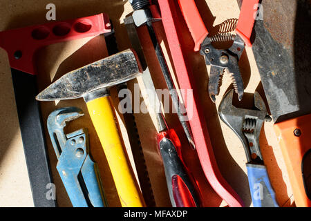 Dirty set of hand tools for house repairs on craft background Stock Photo