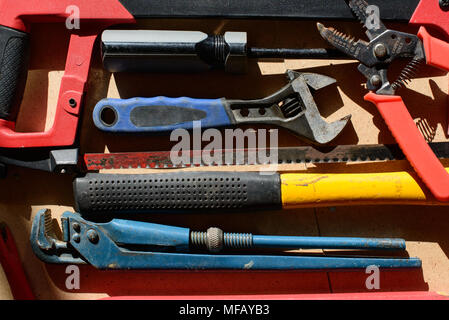 Dirty set of hand tools for house repairs on craft background Stock Photo