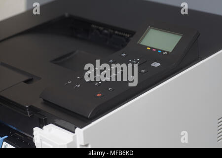 Laser color printer on a gray background Stock Photo
