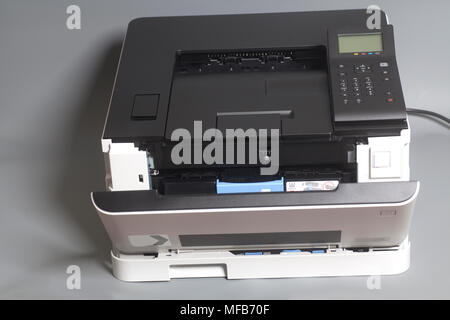 Laser color printer on gray background Stock Photo