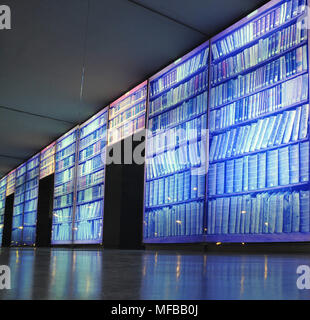 An audio visual screen of some of the books held in the monastery of Montserrat , Spain. as seen in the museum. Stock Photo