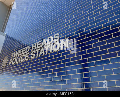 front of new Tweed Heads Police Station including sign on tiled wall Stock Photo