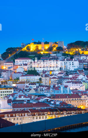 Lisbon Portugal city, evening view of the Castelo de Sao Jorge sited on a hill above the old town Mouraria quarter in Lisbon, Portugal. Stock Photo