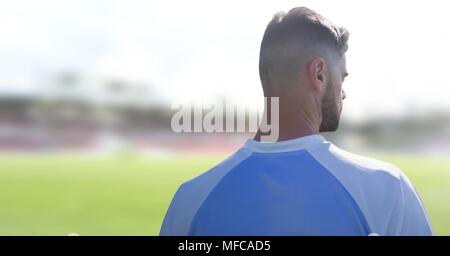 Sports player on pitch field Stock Photo