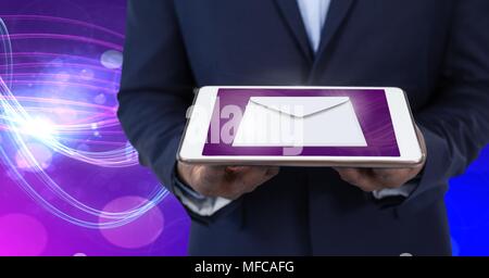 Envelope letter message and man using tablet Stock Photo