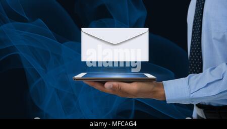 Envelope letter message and man using tablet Stock Photo