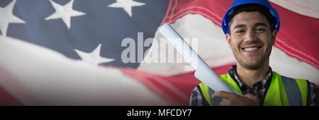 Composite image of happy construction worker Stock Photo