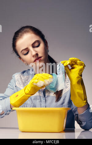 conceptual image on which the woman launder shady money Stock Photo