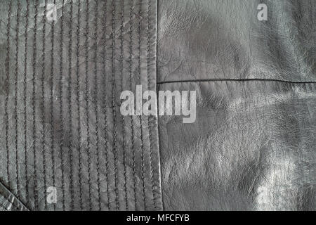 black Natural leather texture with stitches. Closeup. Stock Photo