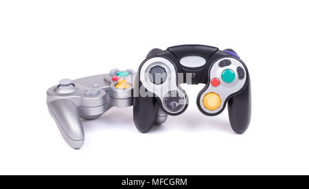 Video game controllers on white background with clipping path Stock Photo