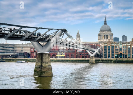 London Millennium Bridge over Thames river with St. Paul Cathedral in the background. Stock Photo