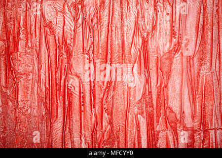 Red bumpy wall stucco texture background, crumpled leather imitation Stock Photo