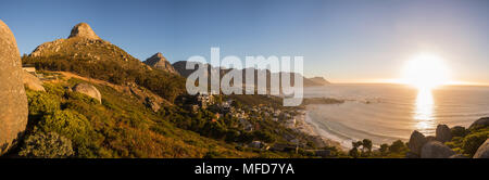 View of Lions Head and the Twelve Apostles at sunset in Cape Town Stock Photo