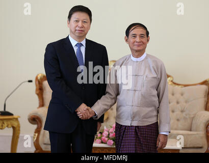 Nay Pyi Taw, Myanmar. 25th Apr, 2018. Visiting head of the International Department of the Communist Party of China (CPC) Central Committee Song Tao (L) shakes hands with Myanmar President U Win Myint during their meeting in Nay Pyi Taw, Myanmar, on April 25, 2018. Credit: U Aung/Xinhua/Alamy Live News Stock Photo