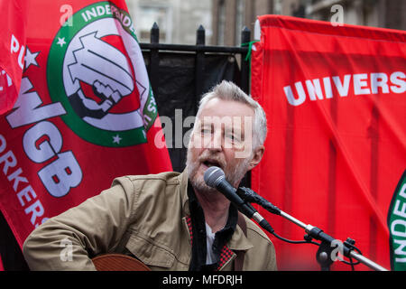 London, UK. 25th April, 2018. Singer songwriter Billy Bragg performs outside University of London Senate House in solidarity with workers belonging to the Independent Workers Union of Great Britain (IWGB) employed by outsourcing companies contracted to the university currently striking to demand equal terms and conditions with those directly employed by the university. Cleaners, porters, security officers, receptionists, gardeners, post room staff and audiovisual staff have joined the strike after a near unanimous vote for industrial action. Credit: Mark Kerrison/Alamy Live News Stock Photo