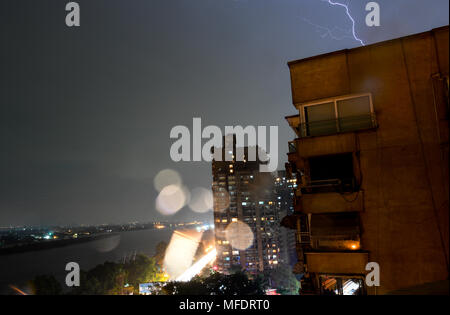 Cairo, Egypt. 25th Apr, 2018. A lightning flashes over Cairo, Egypt, on April 25, 2018. Several parts of Cairo and Giza witnessed heavy rainfall with lightning and thunder on Wednesday. Credit: Wu Huiwo/Xinhua/Alamy Live News Stock Photo