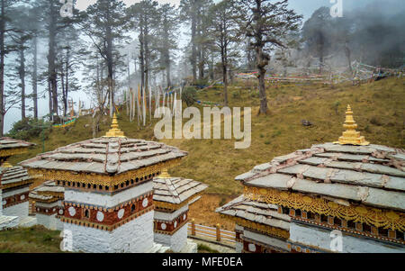 The 108 chortens or stupas is a memorial in honour of the Bhutanese soldiers with layer of mountains at Dochula Pass on the way to Thimphu from Punaka Stock Photo