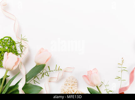 Flowers composition. Frame made of pink flowers on white background. Valentine's Day. Flat lay, top view. Stock Photo