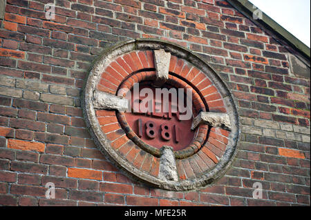 Great Eastern Railway architectural design and date on a building at Acle railway station, Norfolk, UK Stock Photo