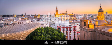 Panoramic view, city view, view from Metropol Parasol to many churches at sunset, Iglesia de la Anunciación, La Giralda and Stock Photo