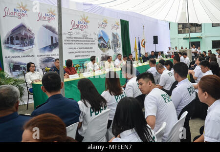 Quezon City, Philippines. 25th Apr, 2018. Among the highlights of the program launch were the signing of Memorandum of Understanding (MOU) and Manifesto of Commitment of members of the Balay Silangan National Oversight Committee, and unveiling of four pilot sites for the implementation of the program namely: General Sanntos City on May 22, 2018; Cabanatuan City on May 24, 2018; the province of Capiz on May 26, 2018; and Caloocan City on May 30, 2018. Credit: Robert Oswald Alfiler/Pacific Press/Alamy Live News Stock Photo