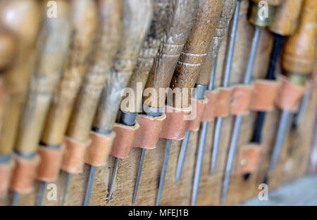 close up of saddle makers tools Stock Photo