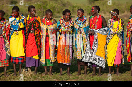 Masai women dancing and singing a welcome song, Kenya. Stock Photo