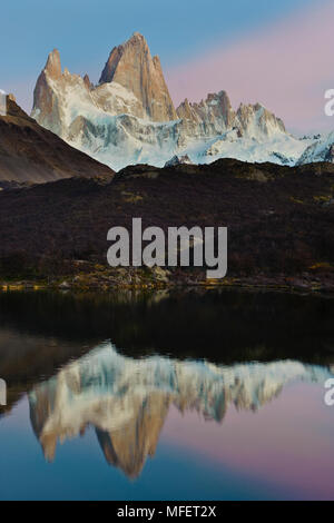 Mount Fitzroy (3375m) reflected in Lago Capri; Los Glaciares National Park, Argentina.  Los Glaciares National Park is located in the area known as th Stock Photo