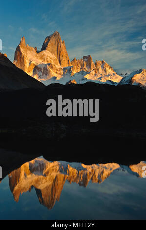 Mount Fitzroy (3375m) reflected in Lago Capri; Los Glaciares National Park, Argentina. Stock Photo